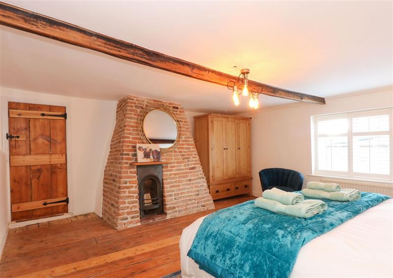 A bedroom in Well Cottage at Well Cottage, Grimston