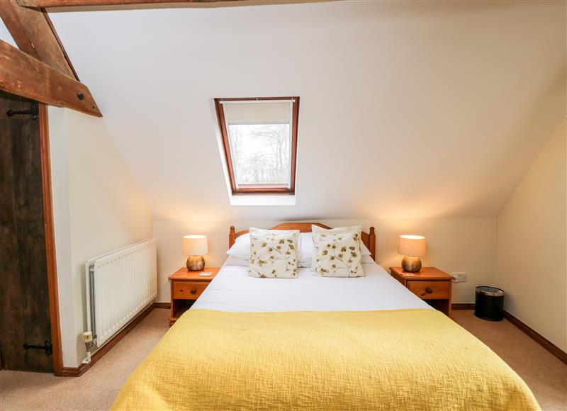 A bedroom in Well Cottage at Well Cottage, Oddington near Stow-On-The-Wold