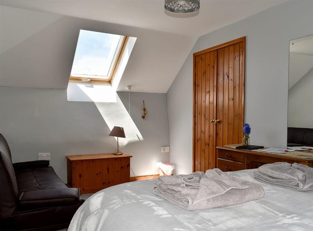 Tranquil double bedroom with sitting area (photo 2) at Cider Cottage, 