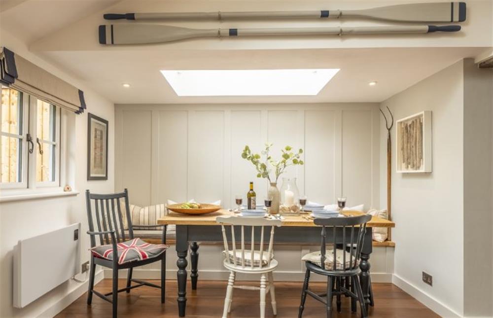 Dining table with chairs and bench seating