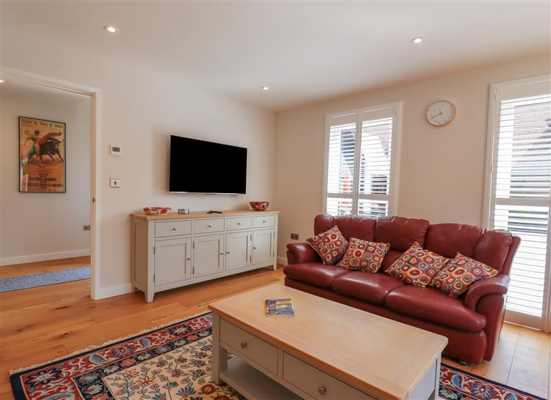 Relax in the living area at Wellington Cottage, Littleport