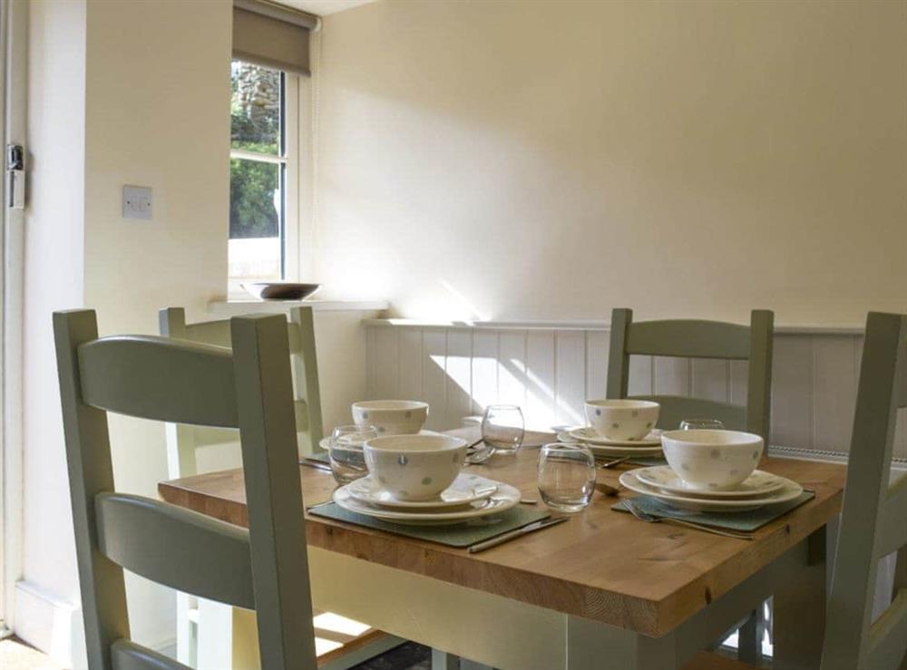 Airy dining area at Wells Cottage in Hook Norton, near Chipping Norton, Oxfordshire