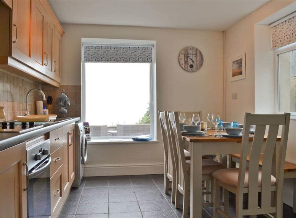 Kitchen with dining area at Wendon in Criccieth, near Porthmadog, Gwynedd