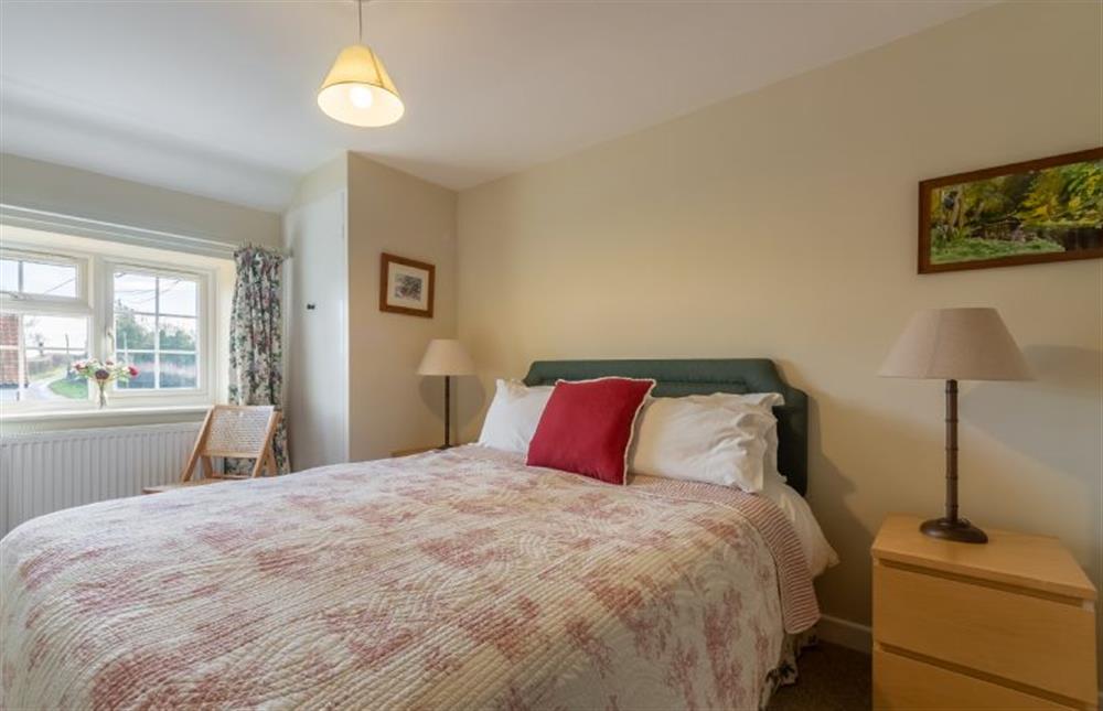 First floor: Bedroom two with a king-size bed at Wensum Farm Cottage, West Rudham near Kings Lynn
