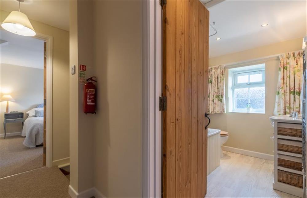 First floor: Showing the family bathroom and the bedroom from the landing at Wensum Farm Cottage, West Rudham near Kings Lynn
