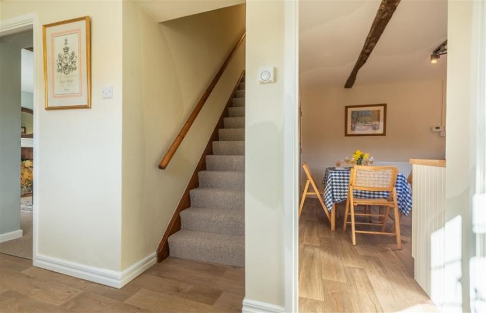 Ground floor: Showing kitchen and stairs from the hallway at Wensum Farm Cottage, West Rudham near Kings Lynn