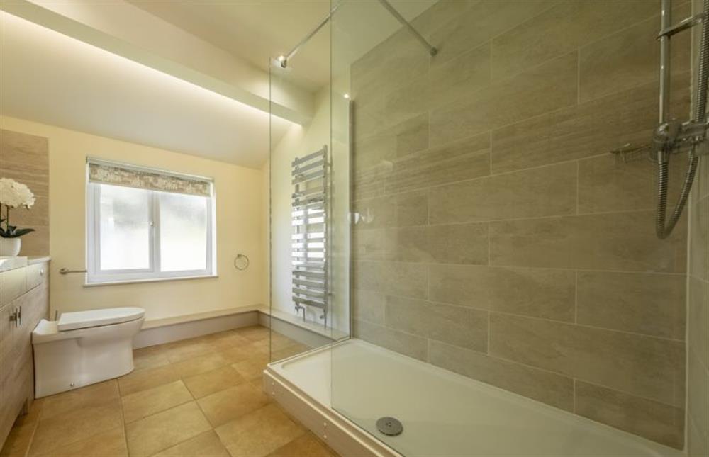 Family bathroom with separate shower and bath, WC and hand basin at Wensum Retreat, South Raynham near Fakenham
