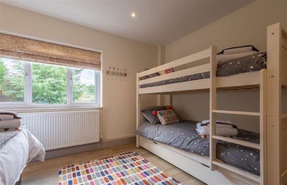 Family bedroom with zip and link Super-king size bed and bunk bed (photo 2) at Wensum Retreat, South Raynham near Fakenham