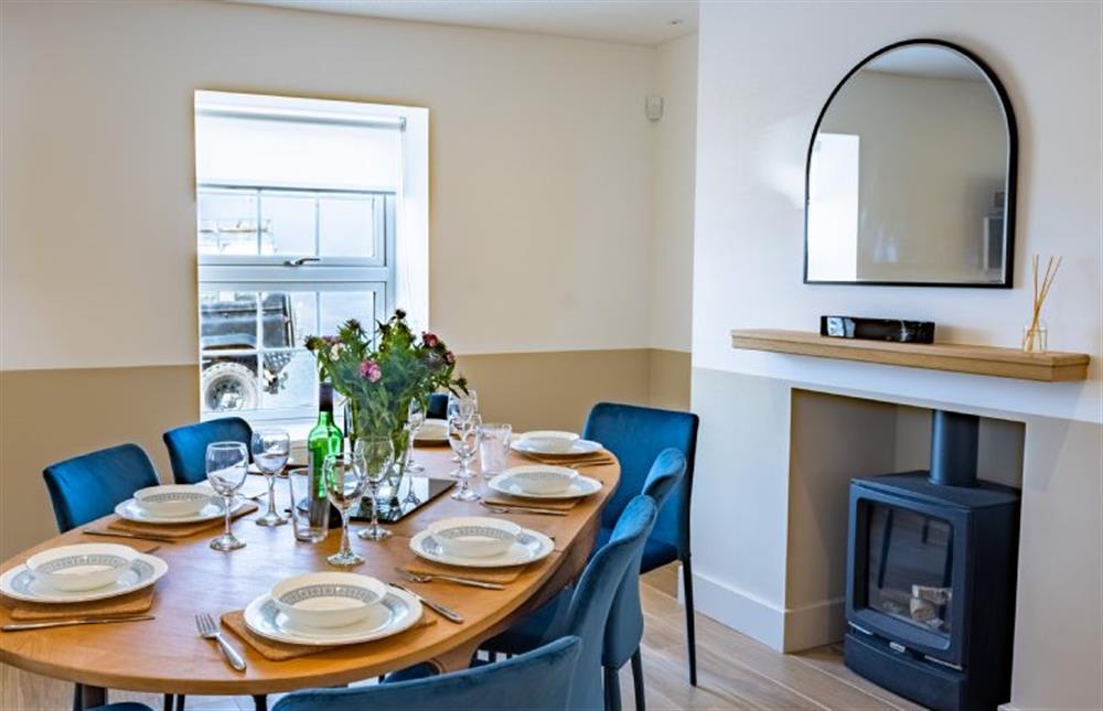 Ground floor: Dining area with gas stove at Wentworth Retreat, Wells-next-the-Sea