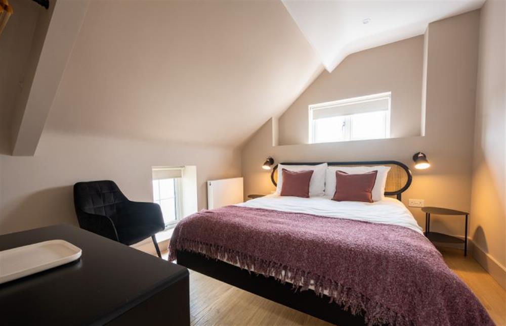 Second floor: Bedroom four with a king-size bed at Wentworth Retreat, Wells-next-the-Sea