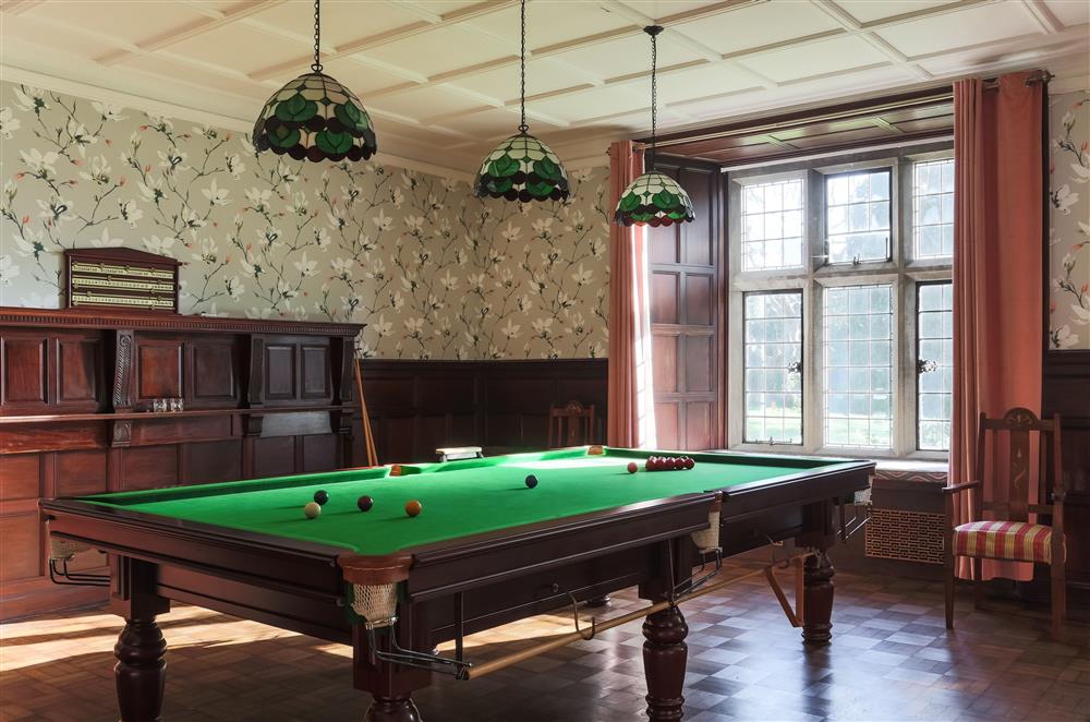Sitting room with a 3/4 size snooker table at Wern Manor and Cottages, Porthmadog