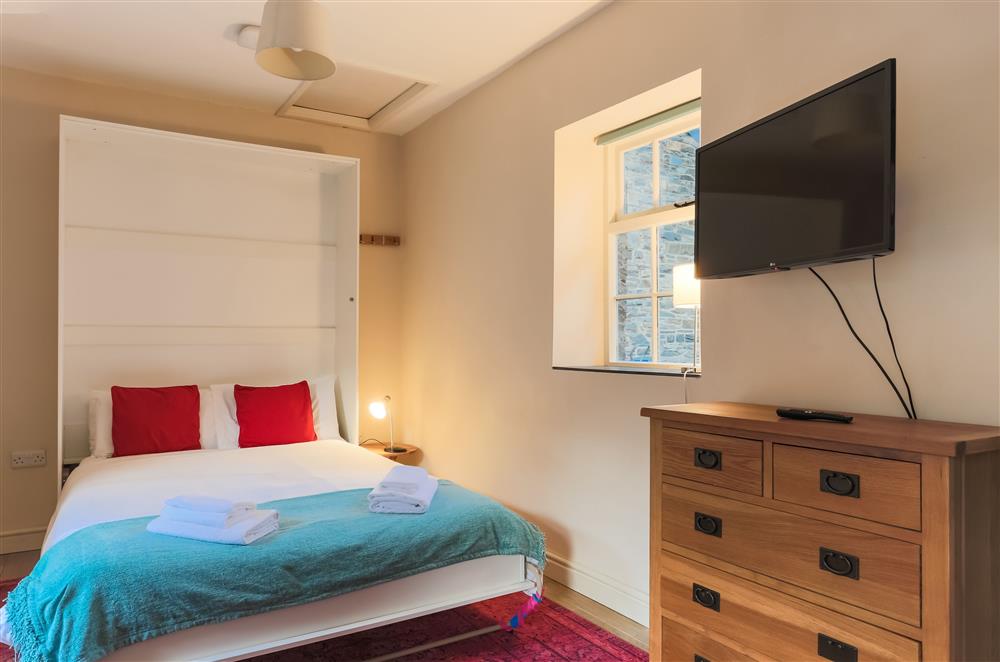 Wood Store bedroom with a Smart television at Wern Manor and Cottages, Porthmadog