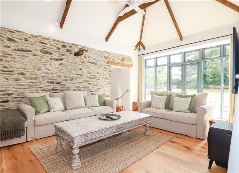 Relax in the living area at Wesley Barn, Cubert