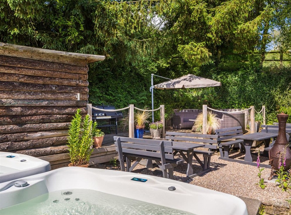Hot tub at West Anstey Farmhouse in West Anstey, Devon