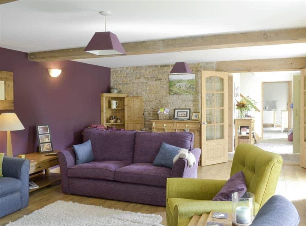 Spacious living room at West Barn in Holymoorside, near Chesterfield, Derbyshire