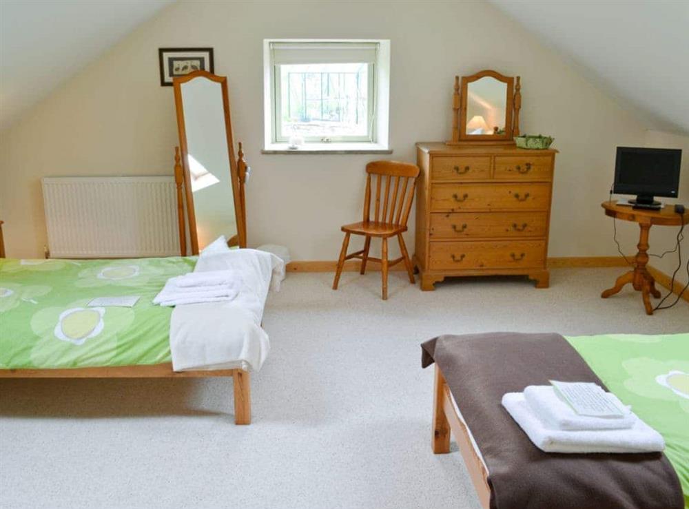 Twin bedroom at West Barn in Holymoorside, near Chesterfield, Derbyshire