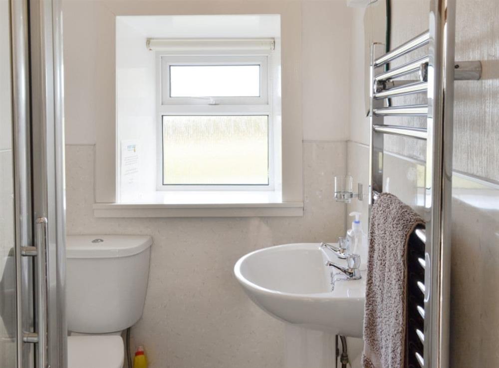 Shower room with heated towel rail at West Barr Cottage, 