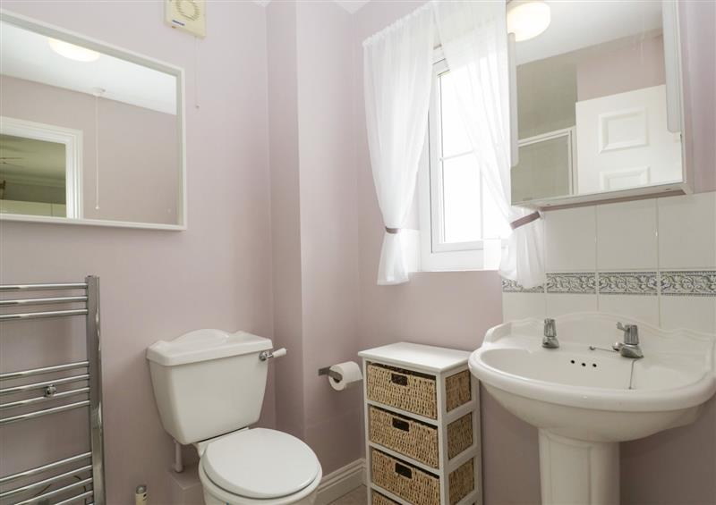 This is the bathroom at West Bay Holiday Home, West Bay