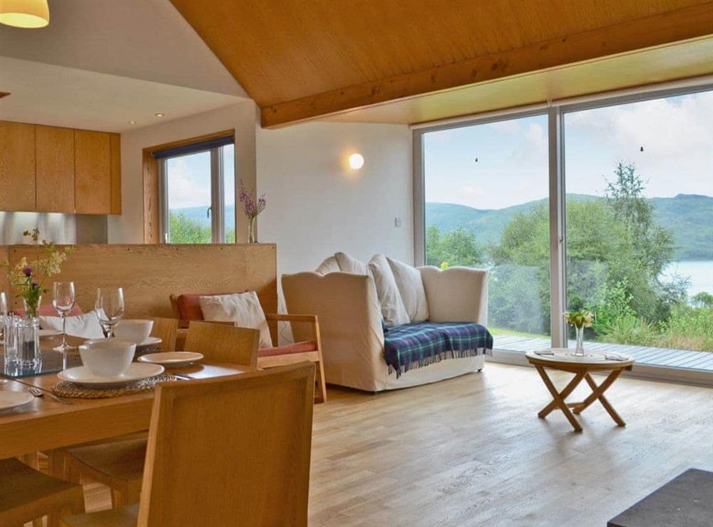 Architect-designed open plan living space with large picture windows letting the countyside inside at West Bothy in Laga, near Acharacle, Argyll