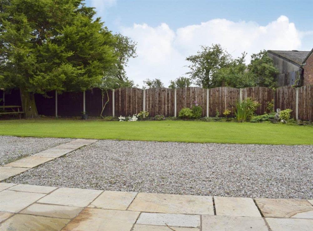 Shared enclosed lawnd <br />garden at West Boundary Farm Cottage 2, 