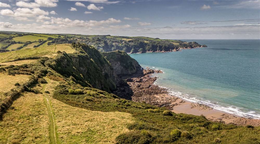 An aerial view of Wild Pear Beach, near West Challacombe Manor and Cottage, Devon at West Challacombe Manor in West Exmoor, Devon