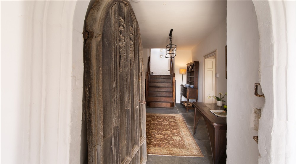 The original oak door leading into the hallway at West Challacombe Manor in West Exmoor, Devon