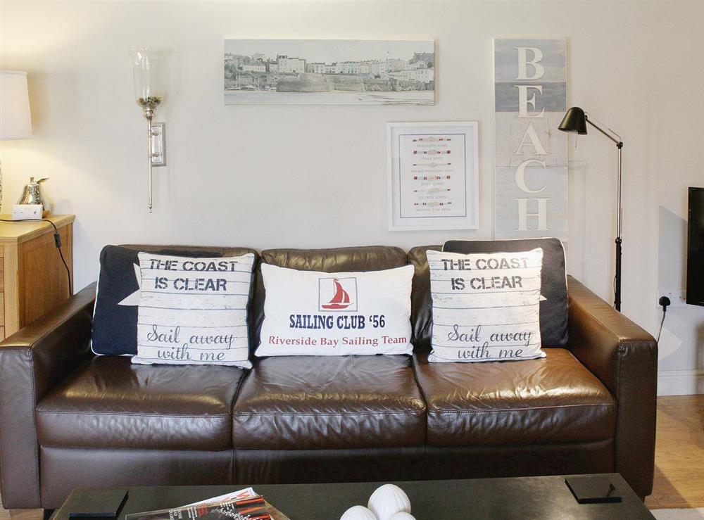 Comfortable leather sofas and lovely soft furnishings
