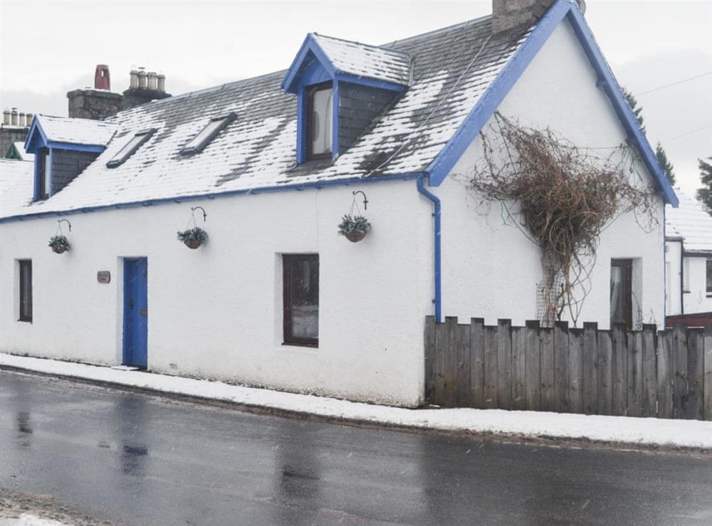 Winter snow exterior at West End Cottage in Carrbridge, near Aviemore, Highlands, Inverness-Shire