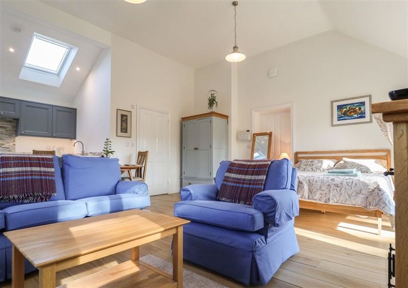 Relax in the living area (photo 3) at West End, Martlesham Village