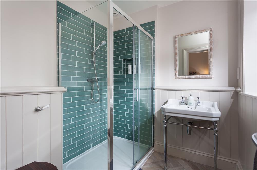 Bedroom four’s en-suite shower room, with spacious walk-in shower at West Gables, Arley 