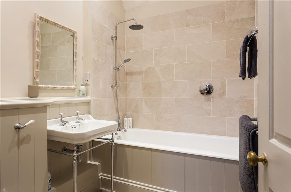 Bedroom one’s en-suite bathroom, with over-head shower at West Gables, Arley 