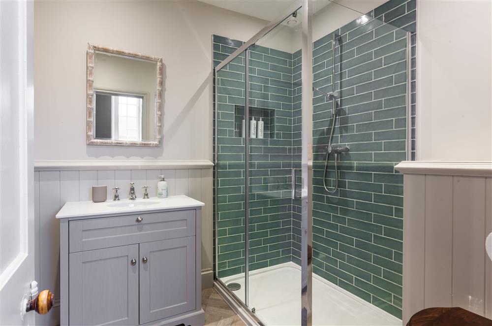 Bedroom three’s en-suite shower room, with spacious walk-in shower at West Gables, Arley 