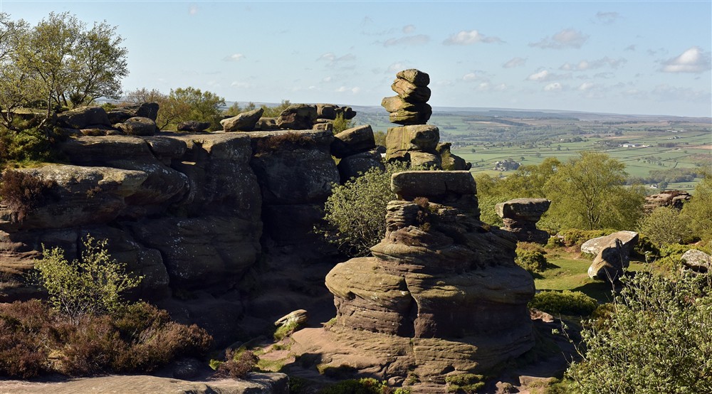 Prehistoric rocks tower above a far-reaching view of the Yorkshire countryside at West Gate Lodge in Ripon, North Yorkshire