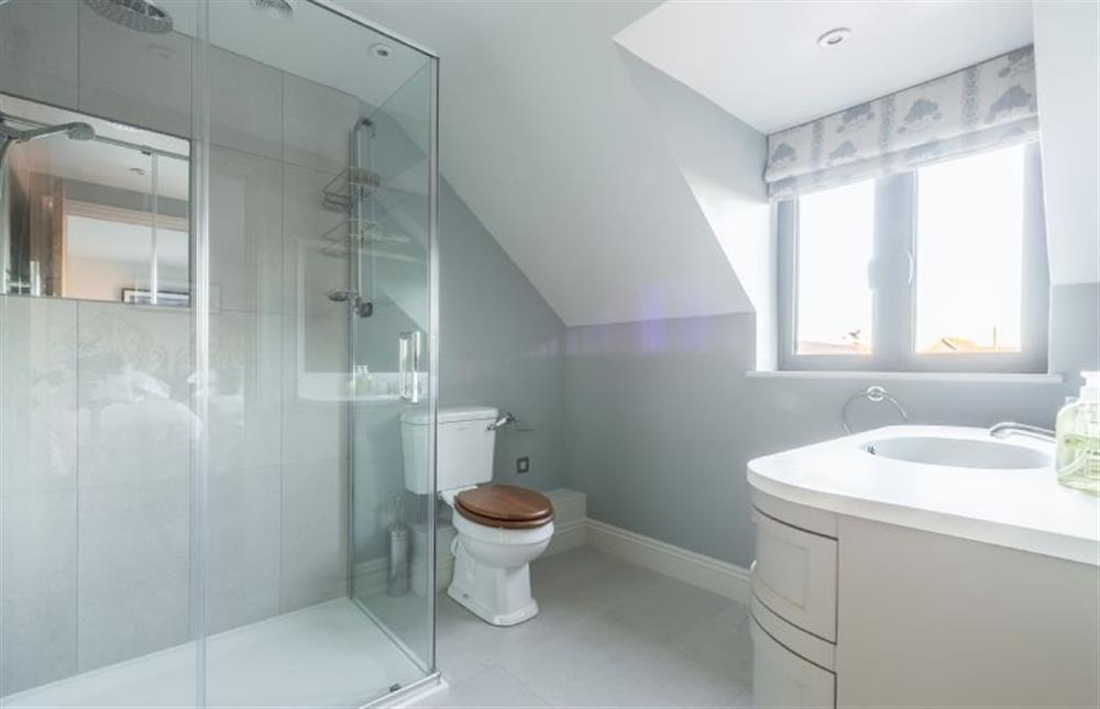 First floor: En-suite shower room in bedroom two at West Heath, Brancaster Staithe near Kings Lynn