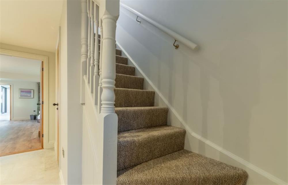 Ground floor: The hallway and stairs at West Heath, Brancaster Staithe near Kings Lynn