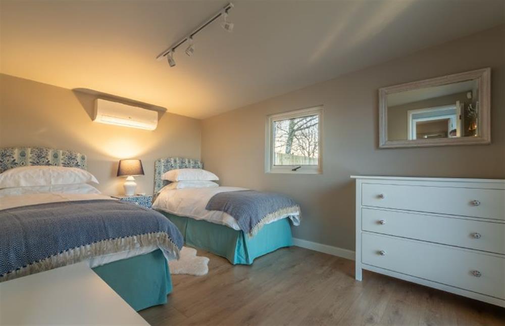 The Pod: Bedroom three has twin beds at West Heath, Brancaster Staithe near Kings Lynn