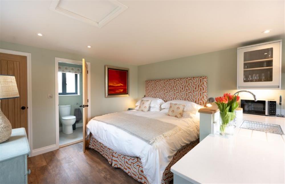 The Siding: Main room with super-king size bed at West Heath, Brancaster Staithe near Kings Lynn