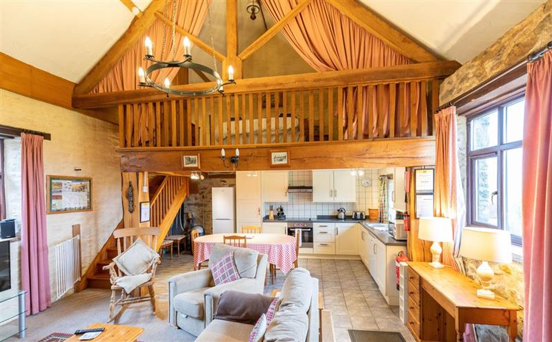 Relax in the living area at West Hollowcombe Farm Cottages - full site, Dulverton