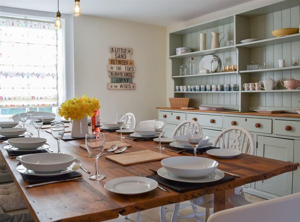 Spacious dining room with traditional furniture at West House Farm in Muston, near Filey, North Yorkshire