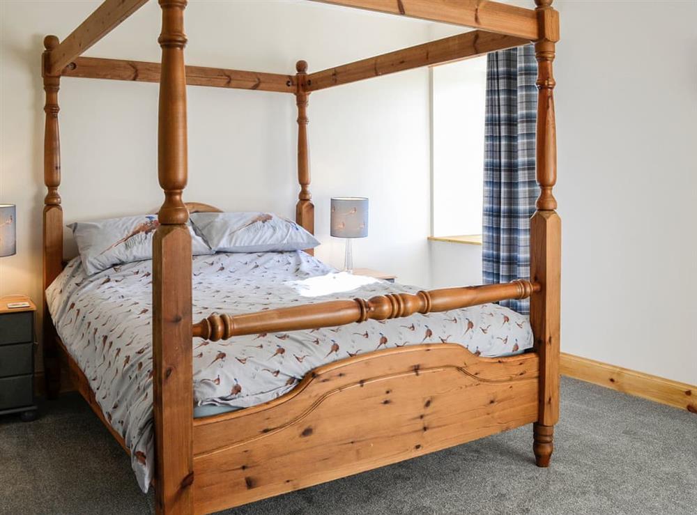 Four Poster bedroom at West Lanegate Farmhouse in Amisfield, Dumfriesshire