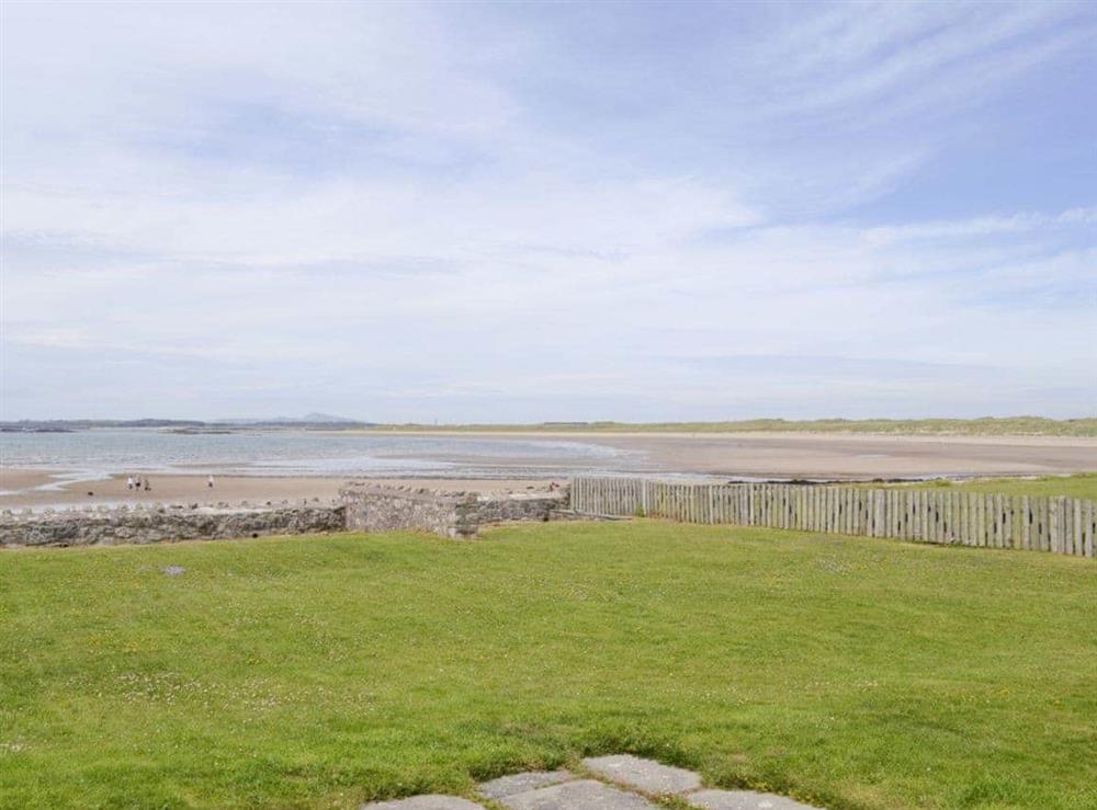 Enclosed lawned garden with beach access at West Lawn in Rhosneigr, Anglesey., Gwynedd