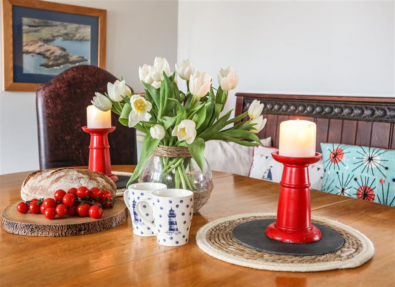 Enjoy the living room at West Lighthouse Keepers Cottage, Llaneilian near Amlwch