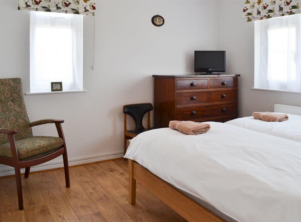 Attractively furnished bedroom at The Old Creamery, 
