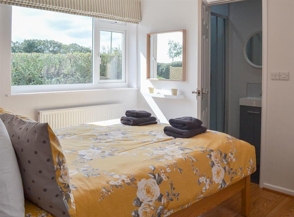 Welcoming double bedroom with en-suite at The Old Creamery, 
