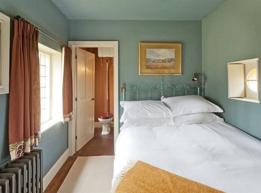 Sumptuous double bedroom at West Pepperpot Lodge in Wimborne St Giles, England