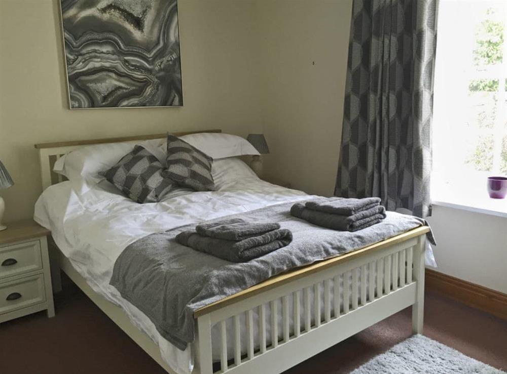 Comfortable double bedroom at West View Cottage in Seahouses, Northumberland