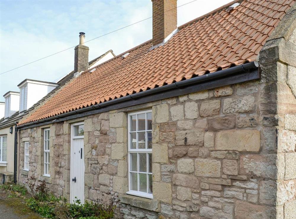 Traditional stone-work façade at West View Cottage in Seahouses, Northumberland