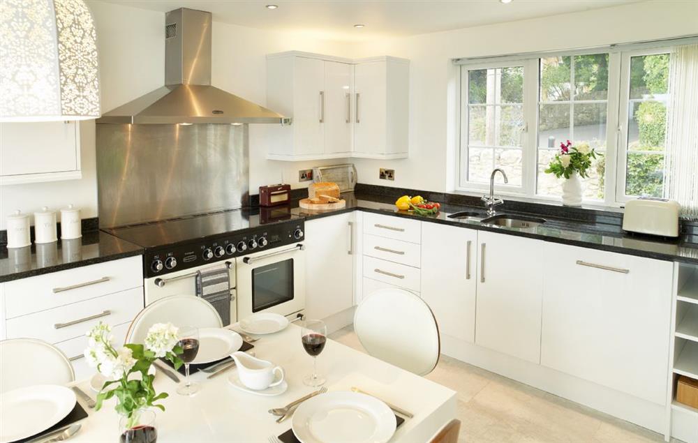 Open plan kitchen with dining area at West Winnowing, Niton Undercliff