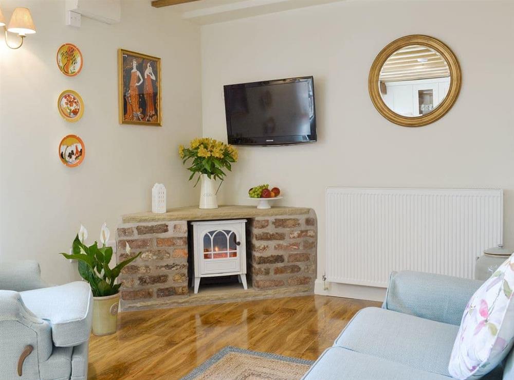 Welcoming living area at West Wood Hideaway in Wrelton, near Pickering, North Yorkshire
