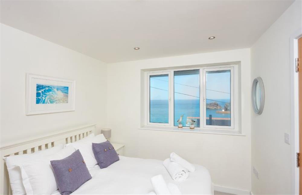 Bedroom three with double bed and sea view at Westaway, Portreath